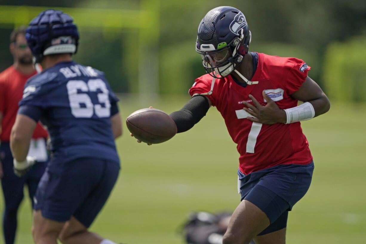 Seattle Seahawks quarterback Geno Smith (7) will likely start Saturday's preseason opener against the Pittsburgh Steelers. (Photos by Ted S.