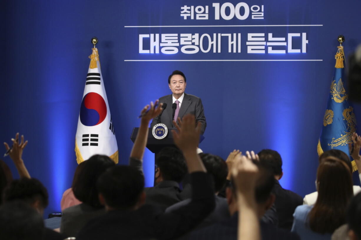 South Korean President Yoon Suk Yeol takes a question during a news conference to mark his first 100 days in office at the presidential office in Seoul, South Korea, Wednesday, Aug. 17, 2022.
