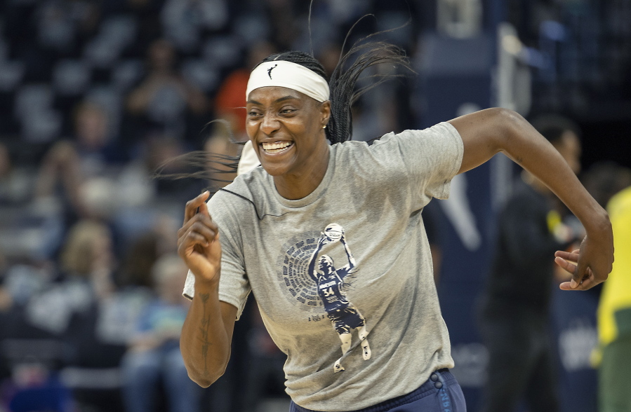 Minnesota Lynx's Sylvia Fowles races off the court after warming up for the team's WNBA basketball game against the Seattle Storm on Friday, Aug. 12, 2022, in Minneapolis.