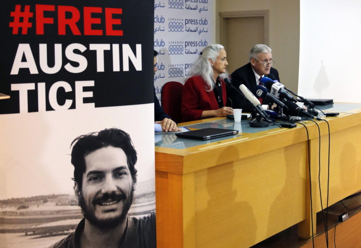 FILE - Marc and Debra Tice, the parents of Austin Tice, who is missing in Syria, speak during a press conference, at the Press Club, in Beirut, Lebanon, Dec. 4, 2018. The Syrian Foreign Ministry denied on Wednesday, Aug. 17, 2022, that it is holding U.S. journalist Austin Tice or other Americans after President Joe Biden accused the Syrian government of detaining him. Tice went missing shortly after his 31st birthday on Aug. 14, 2012 at a checkpoint in a contested area west of the capital Damascus.