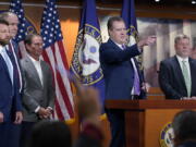 House Intelligence Committee ranking member Rep. Mike Turner, R-Ohio, second from right, joined by other Republicans on the committee, calls on a reporter during a news conference on Capitol Hill in Washington, Friday, Aug. 12, 2022, on the FBI serving a search warrant at former President Donald Trump's home in Florida.