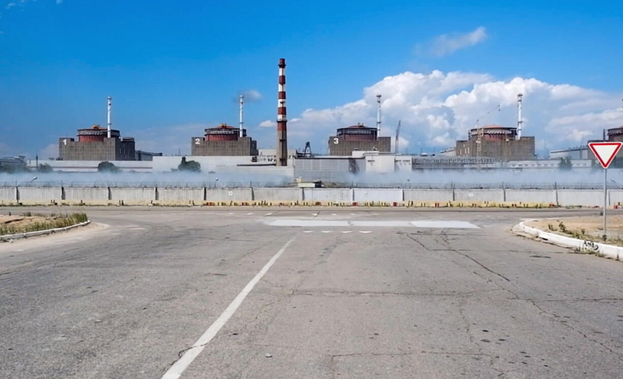FILE - In this handout photo taken from video and released by Russian Defense Ministry Press Service on Aug. 7, 2022, a general view of the Zaporizhzhia Nuclear Power Station in territory under Russian military control, southeastern Ukraine. The Zaporizhzhia plant is in southern Ukraine, near the town of Enerhodar on the banks of the Dnieper River. It is one of the 10 biggest nuclear plants in the world. Russia and Ukraine have accused each other of shelling Europe's largest nuclear power plant, stoking international fears of a catastrophe on the continent.