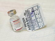 A vial of the Pfizer COVID-19 vaccine for children 6 months through 4 years old is seen June 21, 2022, at Montefiore Medical Group in the Bronx borough of New York. New data from Pfizer and BioNTech show their tot-sized COVID-19 vaccine was 73% effective in protecting children younger than 5 as omicron spread in the spring. Vaccinations for babies, toddlers and preschoolers opened in the U.S. in June after months of delay. Pfizer's three-dose version was authorized with only preliminary effectiveness data -- evidence the company updated on Tuesday, Aug. 23, 2022.