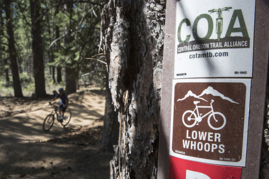 A mountain biker makes their way down a section of Lower Whoops Trail in Central Oregon near Bend.