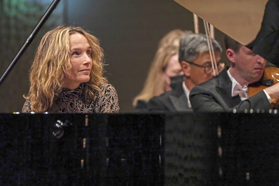 Piano soloist H?(C)l?(R)ne Grimaud performs with the Pittsburgh Symphony Orchestra during their concert at the Elbphilharmonie concert hall in Hamburg, Germany, Wednesday, Aug. 24, 2022.