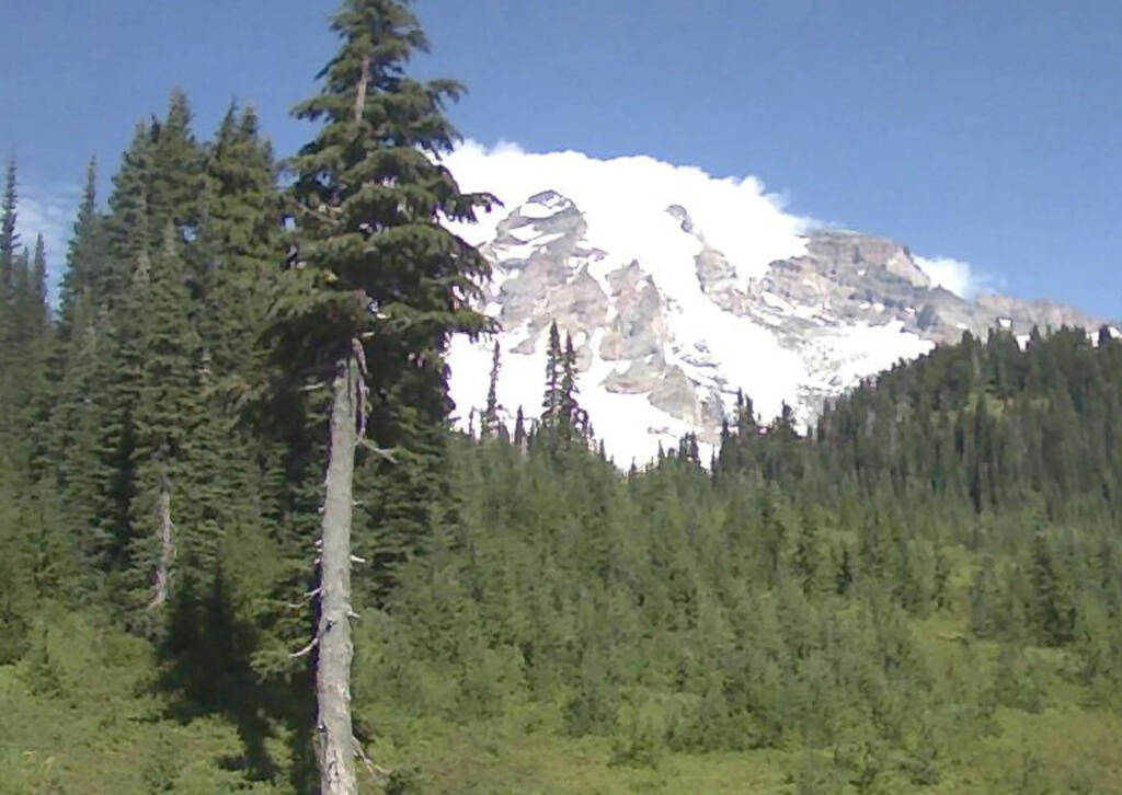The U.S. Geological Survey says that "there is a cloud on the top of #MountRainier. It's not erupting or venting." Volcanologists are at the volcano this week, installing monitoring equipment.