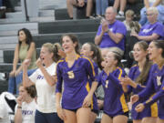 Lauren Dreves (5) and the rest of the Columbia River bench celebrate a point during the Rapids? season-opening win over Woodland on Tuesday, Sept. 6, 2022.