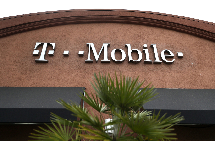 A sign is posted on the exterior of a T-Mobile store on April 30, 2018 in El Cerrito, California.