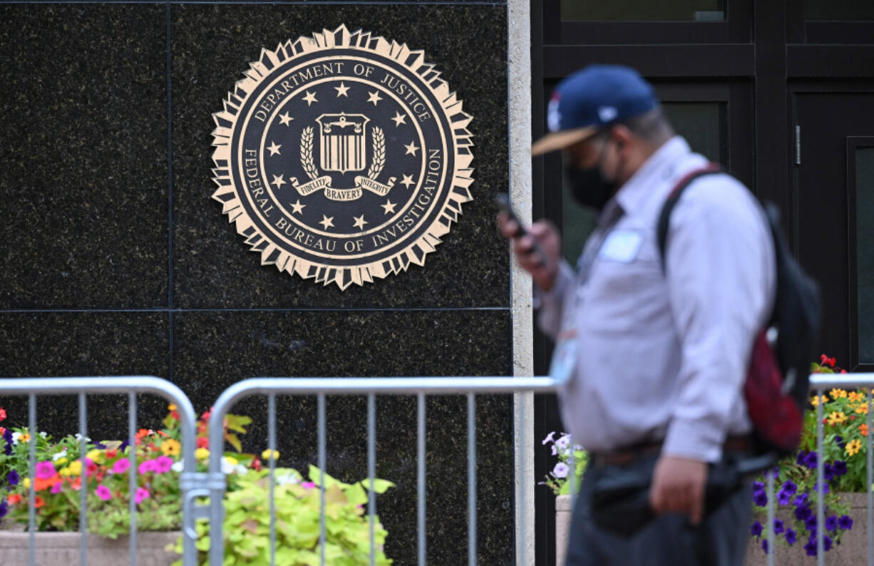 The seal of the Federal Bureau of Investigation is seen outside of its headquarters on Monday, Aug. 15, 2022, in Washington, D.C. The agency considers sovereign citizens an anti-government extremist movement.