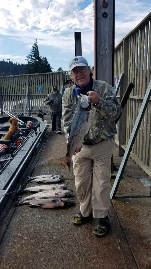 Outdoor reporter Terry Otto with a typical fall Chinook taken while fishing the mouth of the White Salmon River with guide Bill Monroe Jr.