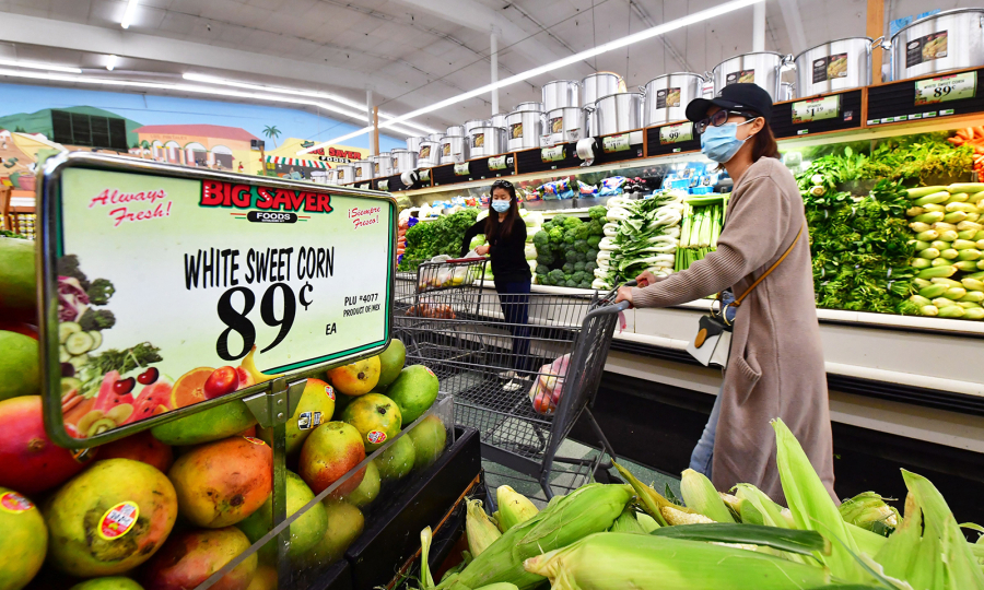 People grocery shop April 21 in Rosemead, Calif. Unprocessed, whole foods are things like fresh fruits and vegetables, rice, meat and eggs. (Frederic J.