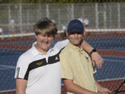 Hudson's Bay doubles team Braden Thacker (left) and Hudson Wright pose during a match at Ridgefield. Last week, Thacker and Wright won their No. 3 doubles match, giving Thacker, a senior, his first varsity win of his high school career and helped Bay get an elusive team victory.
