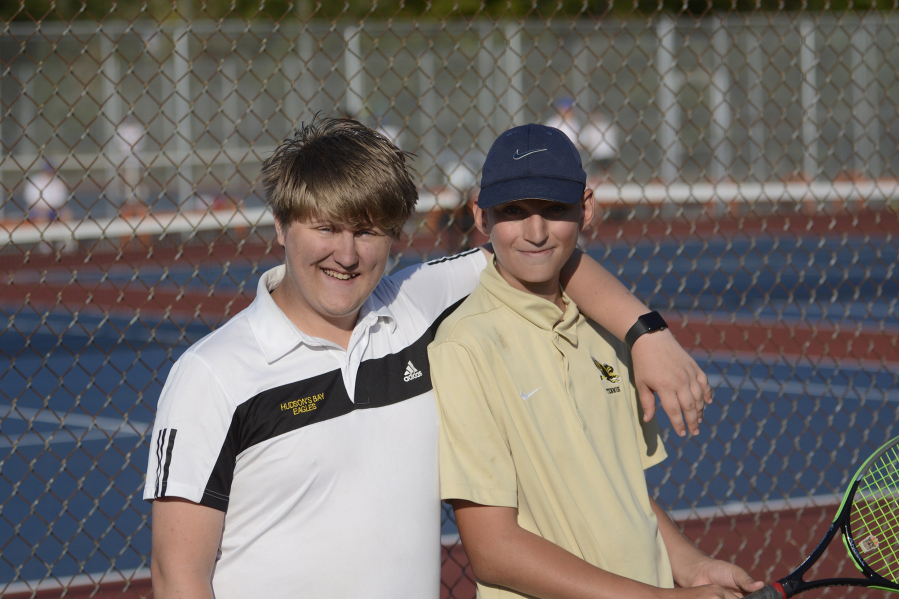 Hudson's Bay doubles team Braden Thacker (left) and Hudson Wright pose during a match at Ridgefield. Last week, Thacker and Wright won their No. 3 doubles match, giving Thacker, a senior, his first varsity win of his high school career and helped Bay get an elusive team victory.