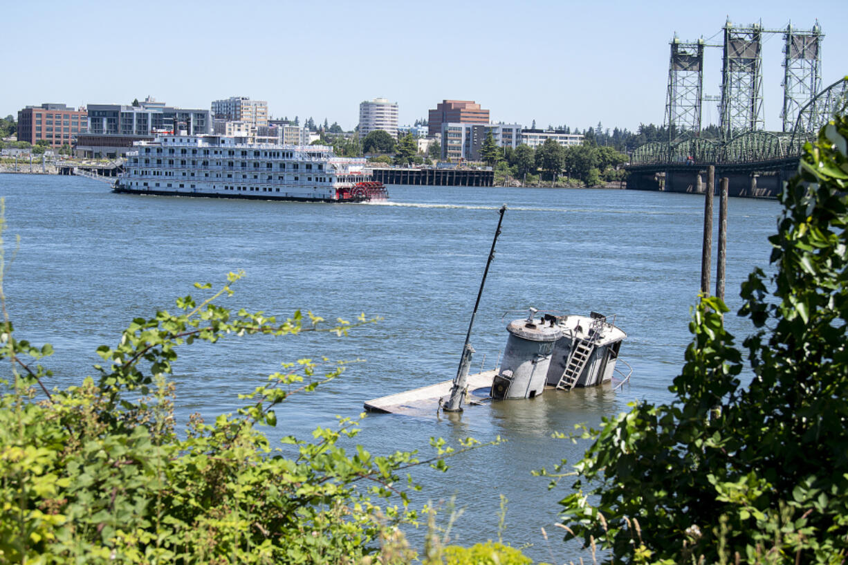 The Coast Guard and other agencies have approved a plan to remove to derelict vessels from the Columbia River. Both are near the Interstate Bridge off the Portland Shore.