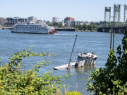 The Coast Guard and other agencies have approved a plan to remove to derelict vessels from the Columbia River. Both are near the Interstate Bridge off the Portland Shore.