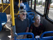 Dick Gill and his wife, Laura, hop on a C-Tran bus in southeast Vancouver to make their way around town on a recent morning. They share  one car, and they try to walk or use the bus as much as possible to get around.
