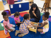 Head Start supervising teacher Tamara Harris playfully cautions students to stay quiet at Evergreen High School on Friday morning. A lack of federal funding has put an even larger dent in the capacity of local Head Start child care and early learning facilities, particularly in Clark County.