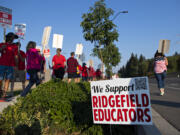 Union members and community members gather to strike after a deal has not been reached between the teachers union and school officials despite working without a contract since Sep. 1, as seen Friday morning, Sept. 9, 2022.