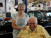 Jan, left, and Dean Johnson each have a separate space at their Ariel home to pursue their individual hobbies. The couple, in their 80s, also enjoy going to car shows with the 1957 Chevy Bel Air behind them in Dean's garage.