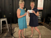 Members of 100 Women Who Care Clark County presented $2,000 to West Columbia Gorge Humane Society on Aug. 17.