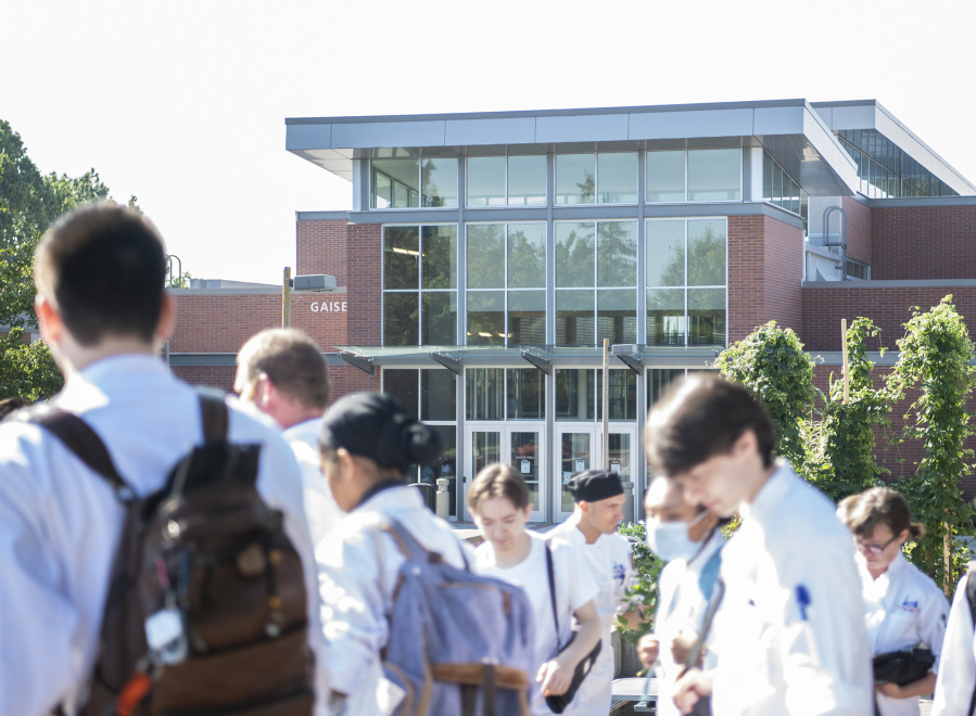Culinary school students walk to class on Sept. 19 outside of Gaiser Hall during the first day of classes at Clark College.