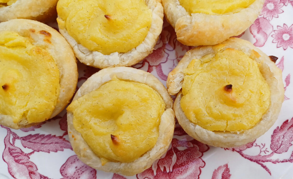 These rich, custard-filled pastry cups are a shortcut version of Portuguese Tarts.