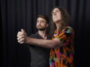 Daniel Radcliffe, left, and "Weird Al" Yankovic strike a pose Sept. 8 at the Bisha Hotel, during the Toronto International Film Festival in Toronto.