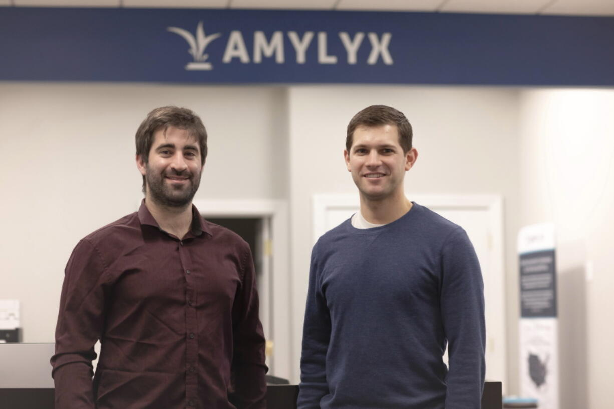 This 2018 photo provided by Amylyx shows the company's co-founders Joshua Cohen, left, and Justin Klee in Cambridge, Mass. A much-debated drug for Lou Gehrig's disease, made by Amylyx, won U.S. approval Thursday, Sept. 29, 2022, a long-sought victory for patients that is likely to renew questions about the scientific rigor behind government reviews of experimental medicines.