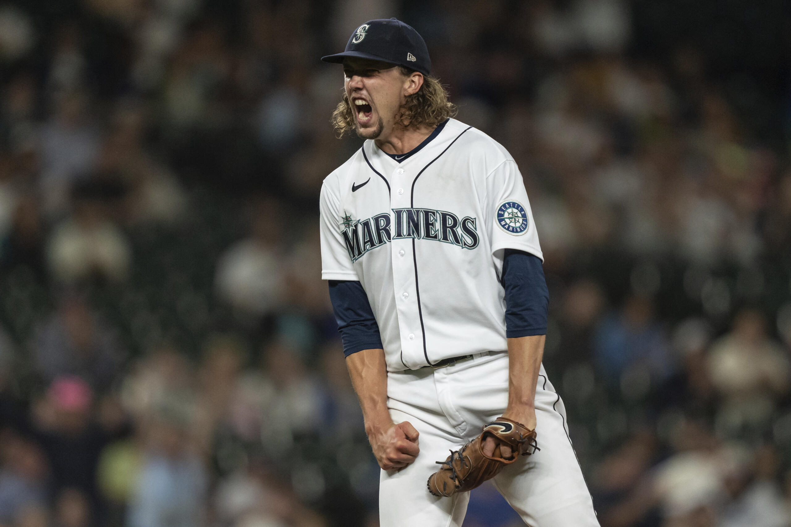 Seattle Mariners starting pitcher Logan Gilbert reacts after striking out Chicago White Sox's AJ Pollock during the sixth inning of a baseball game Tuesday, Sept. 6, 2022, in Seattle.