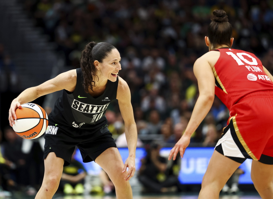 Seattle Storm guard Sue Bird (10) drives against Las Vegas Aces guard Kelsey Plum (10) during the first half of Game 4 of a WNBA basketball playoff semifinal Tuesday, Sept. 6, 2022, in Seattle.
