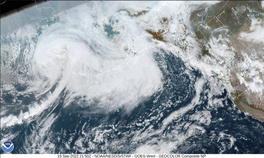 This image provided by the National Hurricane Center and Central Pacific Hurricane Center/National Oceanic and Atmospheric Administration shows a satellite view over Alaska, Thursday, Sept. 15, 2022. A vast swath of western Alaska could see flooding and high winds as the remnants of Typhoon Merbok move toward the Bering Sea region. The National Weather Service had in place coastal flood warnings, beginning Friday, spanning from parts of the Yukon Delta in southwest Alaska up to St. Lawrence Island in the Bering Sea and to the Bering Strait coast.