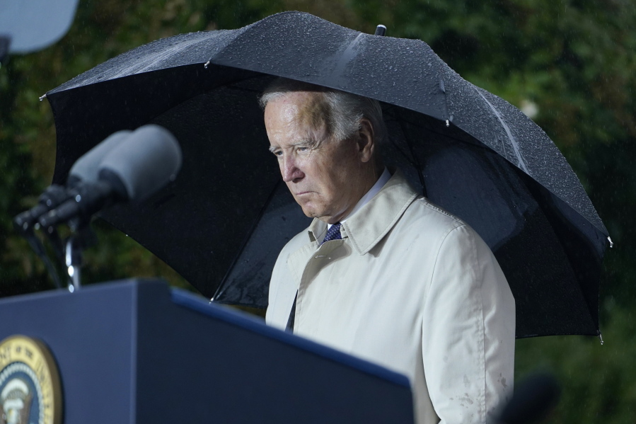 President Joe Biden stands during a moment of silence during a ceremony at the Pentagon in Washington, Sunday, Sept. 11, 2022, to honor and remember the victims of the September 11th terror attack.