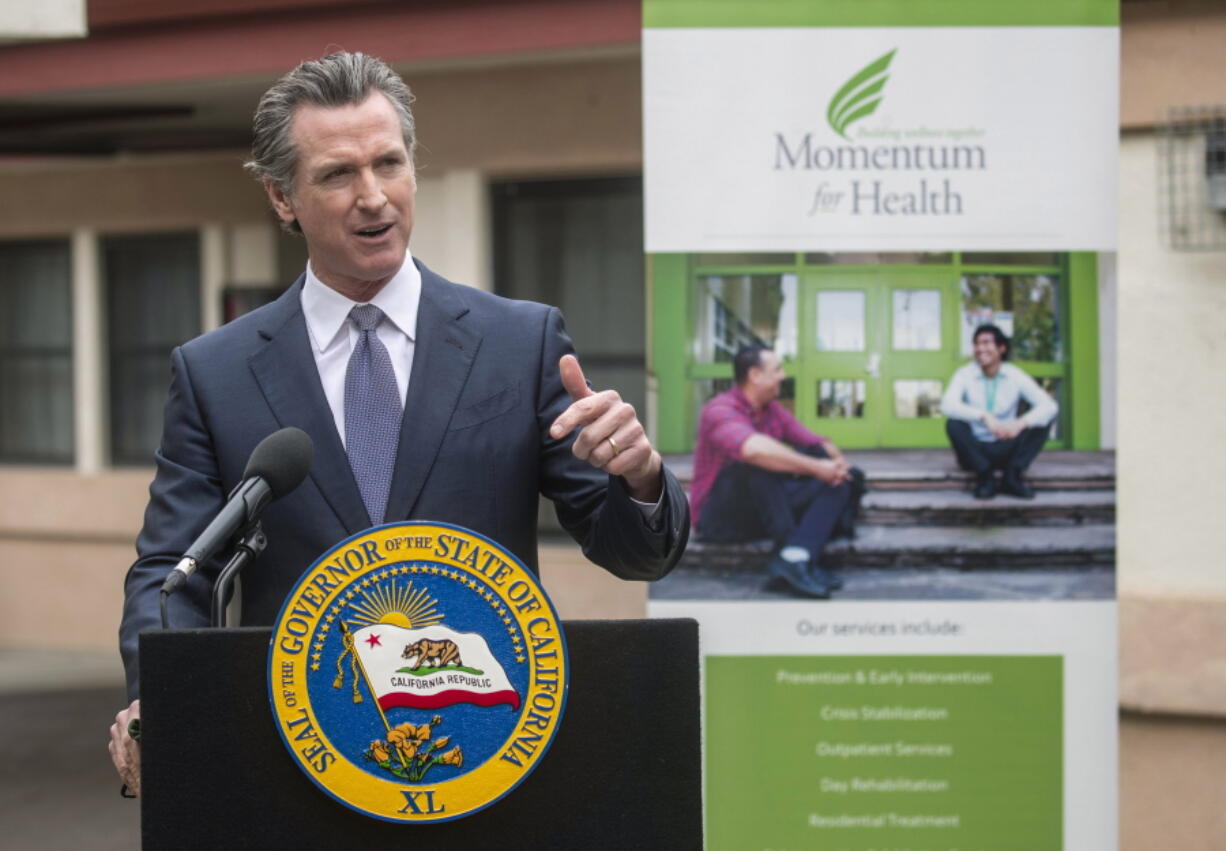 FILE--Gov. Gavin Newsom, speaking at a mental health treatment center in San Jose, Calif., announces "Care Court," a program that would let courts order treatment for some homeless people suffering from mental health disorders on Thursday, March 3, 2022. On Wednesday, Sept. 14, 2022, Newsom signed a law creating the program. He said it will take a few year to fully implement.