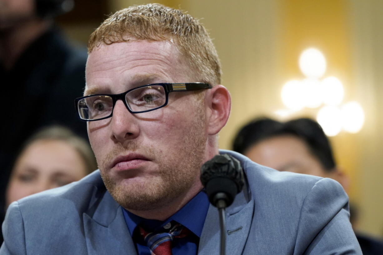 FILE - Stephen Ayres, who pleaded guilty last in June 2022 to disorderly and disruptive conduct in a restricted building, testifies as the House select committee investigating the Jan. 6 attack on the U.S. Capitol holds a hearing at the Capitol in Washington, July 12, 2022. Ayers has been sentenced to two years of probation for his role in the mob's attack. U.S. District Judge John Bates also on Thursday ordered 41-year-old Stephen Ayres to perform 100 hours of community service. Prosecutors had recommended sentencing Ayres to 60 days of incarceration.