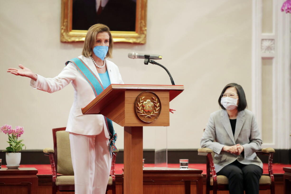 FILE - In this Taiwan Presidential Office photo, U.S. House Speaker Nancy Pelosi speaks during a meeting with Taiwanese President President Tsai Ing-wen, right, in Taipei, Taiwan, on Aug. 3, 2022. China's Foreign Ministry accused the United States of violating its commitment to the "one-China" principle and interfering in internal Chinese affairs on Thursday, Sept. 15, 2022, after the U.S. Senate Foreign Relations committee approved a new bill that could significantly increase American defense support for the island of Taiwan.