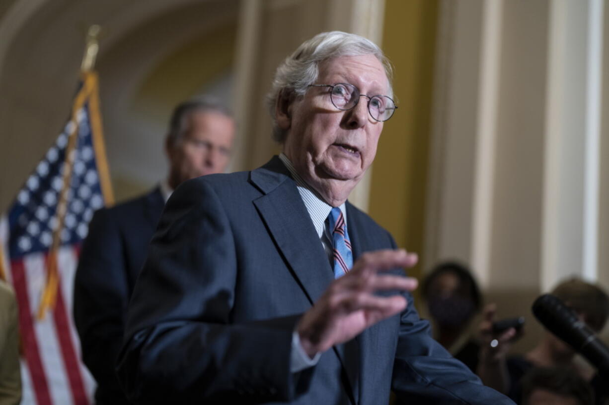Senate Minority Leader Mitch McConnell, R-Ky., talks to reporters as the Senate works to pass a stopgap spending bill that would fund the federal government into mid-December, at the Capitol in Washington, Wednesday, Sept. 28, 2022. (AP Photo/J.