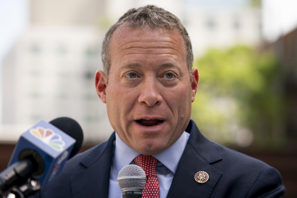 FILE - Rep. Josh Gottheimer, D-N.J., speaks during a news conference on Aug. 15, 2022, in New York. Progressive and centrist Democrats in the House have clinched agreement on a long-sought policing and public safety package that will be brought to the House floor just weeks before the midterm elections. The breakthrough came after intense negotiations in recent days between Gottheimer, a leader of the centrist coalition, and Rep. Ilhan Omar D-Minn., one of the leaders of the progressive faction.