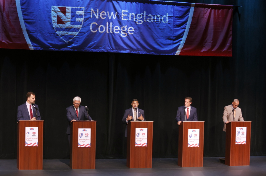 FILE - New Hampshire Republican U.S. Senate candidates from left Bruce Fenton, Chuck Morse, Vikram Mansharamani, Kevin Smith, and Don Bolduc participate in a debate, Wednesday, Sept. 7, 2022, in Henniker, N.H. New Hampshire will hold its primary on Tuesday, Sept. 13.