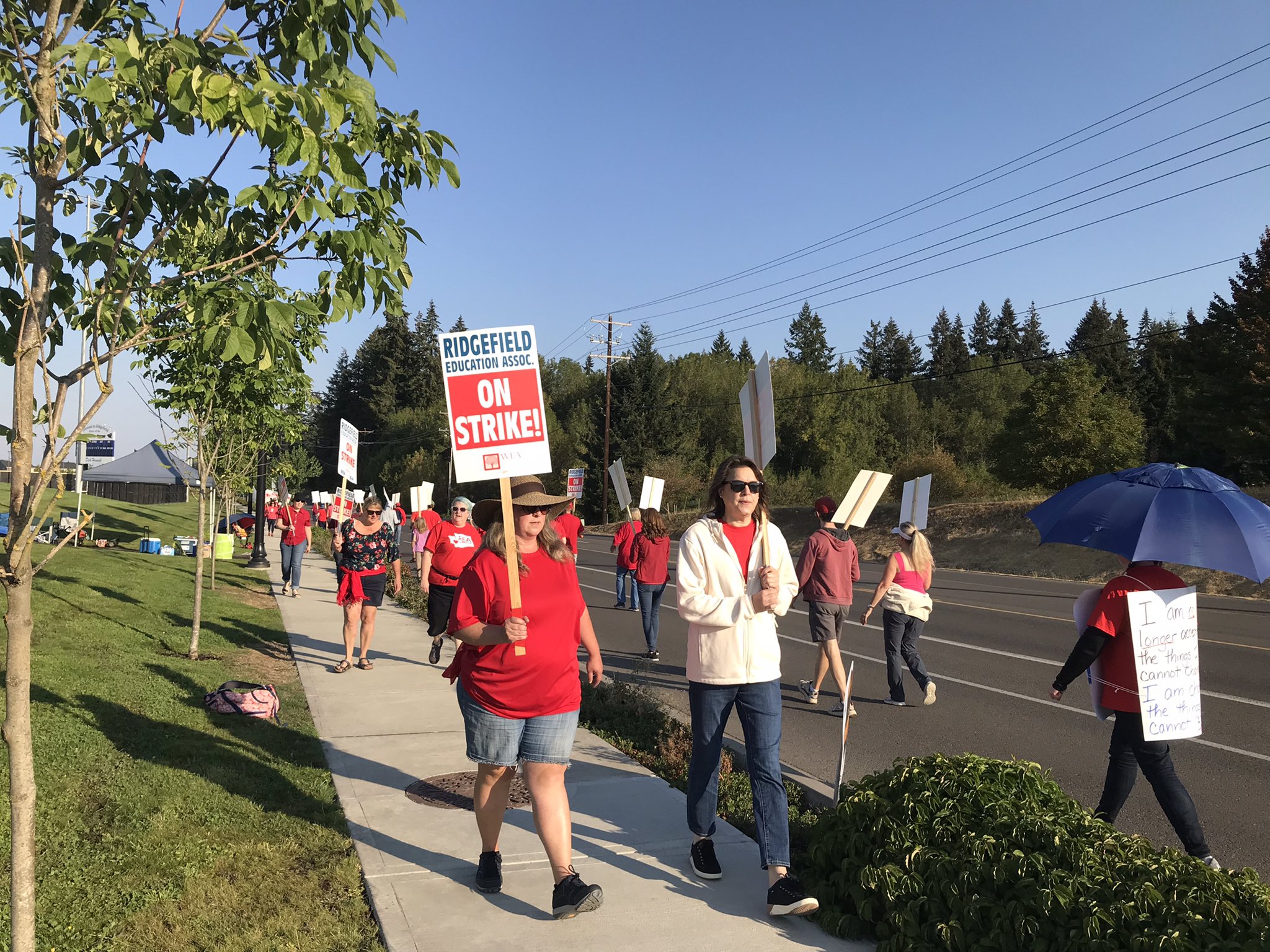 Teachers and supporters take to the picket line outside Sunset Ridge and View Ridge schools in Ridgefield on Friday morning.