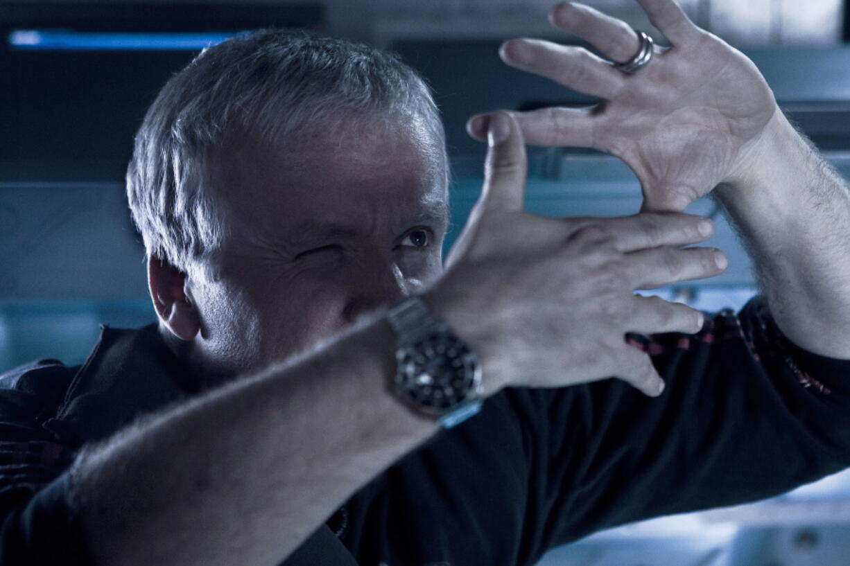 This 2009 image released by 20th Century Films shows filmmaker James Cameron on the set of "Avatar."  Cameron's long-awaited "Avatar" sequel, "The Way of the Water" will be released later this year.  On Friday, "Avatar" will be re-released in theaters.