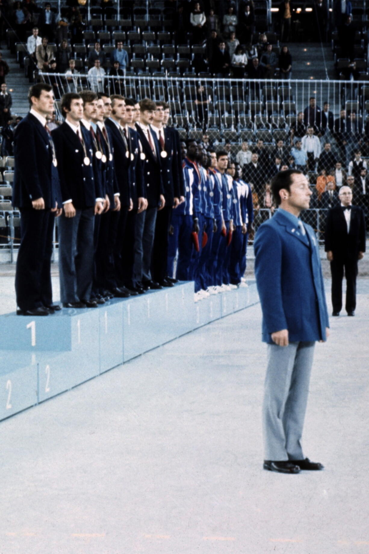 The Soviet Union basketball team stands on the podium after receiving the Olympic gold medal Sept. 10, 1972, in Munich, flanked by the bronze-winning Cubans, right, and a vacant place where the U.S. team, officially given the Olympic silver, was supposed to appear. Members of the 1972 U.S. Olympic men's basketball team have talked about finally retrieving those silver medals they vowed to never accept. No, they still don't want them for themselves. They believe the medals belong in the Naismith Memorial Basketball Hall of Fame, but the latest attempt to get them from the International Olympic Committee has been thwarted.