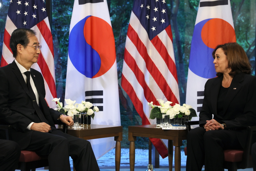 U.S. Vice President Kamala Harris, right, holds a bilateral meeting with South Korea's Prime Minister Han Duck-soo in Tokyo, Tuesday, Sept. 27, 2022.