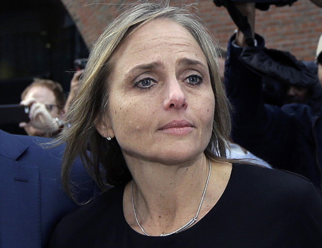 FILE - District court judge Shelley M. Richmond Joseph departs federal court on April 25, 2019, in Boston. Federal prosecutors have agreed to dismiss charges against Joseph, who was accused of helping a man who was living in the U.S. illegally evade an immigration enforcement agent, officials said Thursday, Sept. 22, 2022.