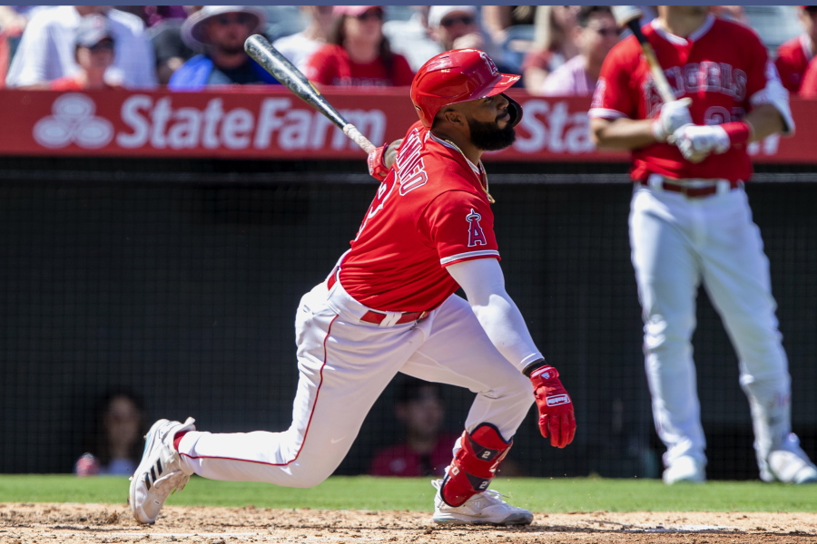Los Angeles Angels' Luis Rengifo watches his two-run home run, his second of the game, against the Seattle Mariners during the third inning of a baseball game in Anaheim, Calif., Sunday, Sept. 18, 2022.