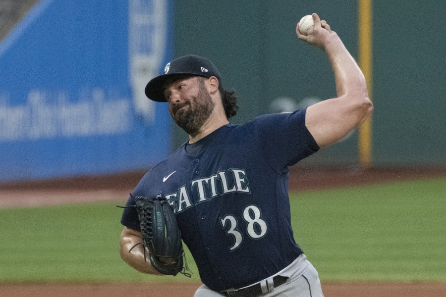 Seattle Mariners starting pitcher Robbie Ray delivers against the Cleveland Guardians during the first inning of a baseball game in Cleveland, Saturday, Sept. 3, 2022.