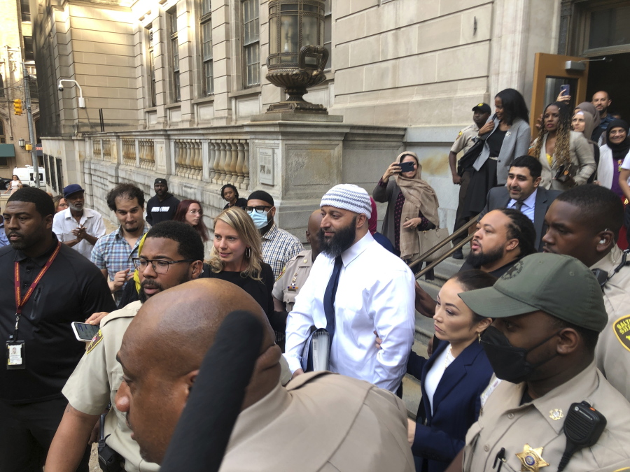 Adnan Syed, center, leaves the Elijah E. Cummings Courthouse, Monday, Sept. 19, 2022, in Baltimore.
