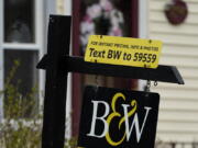 FILE - A sign is displayed outside a home in Wheeling, Ill., May 5, 2022. Average long-term U.S. mortgage rates climbed over 6% this week for the first time since the housing crash of 2008, threatening to sideline even more homebuyers from a rapidly cooling housing market. Mortgage buyer Freddie Mac reported Thursday, Sept. 15, 2022 that the 30-year rate rose to 6.02% from 5.89% last week. (AP Photo/Nam Y.