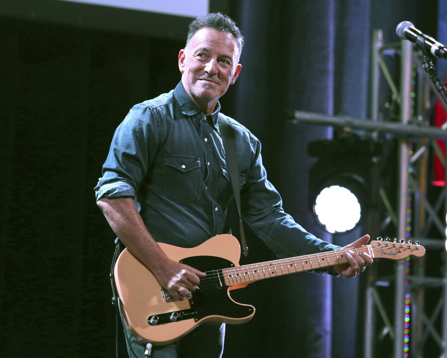 FILE - Bruce Springsteen performs at Stand Up For Heroes in New York on Nov. 1, 2016. Springsteen's most memorable artifacts will travel across the country with a new landing spot in Los Angeles. The Grammy Museum announced Wednesday that Bruce Springsteen Live! will open at the Grammy Museum L.A. Live in downtown Los Angeles on Oct. 15.
