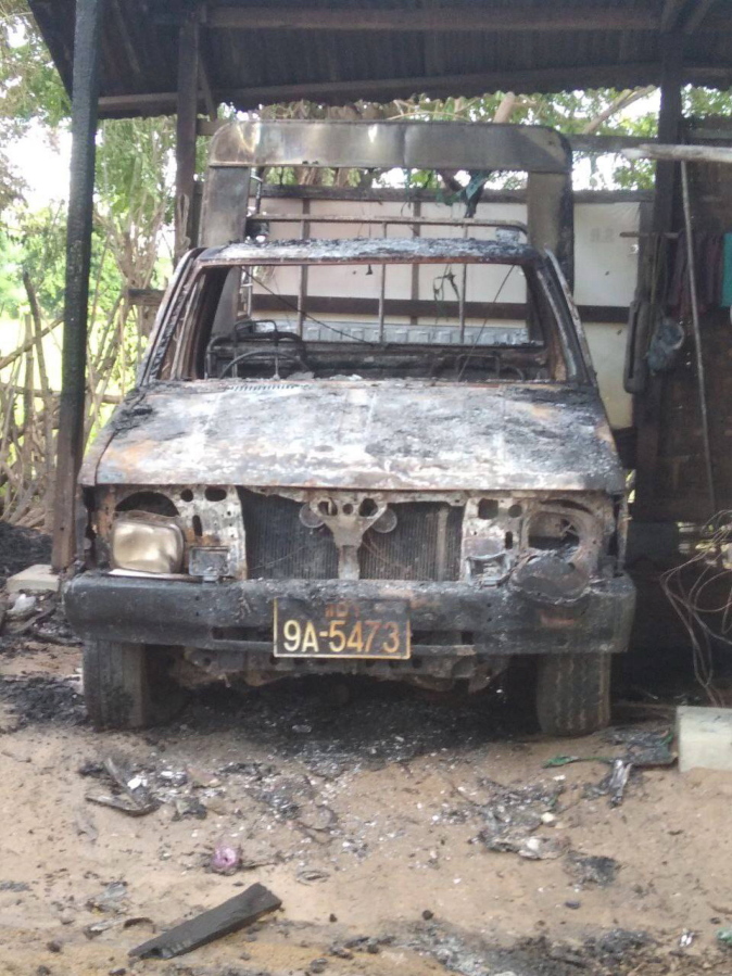 A burnt vehicle stands within a monastery that houses a middle school in Let Yet Kone village in Tabayin township in the Sagaing region of Myanmar on Saturday, Sept. 17, 2022, the day after an air strike hit the school. The attack killed a number of adults and children, according to a school administrator and volunteers assisting displaced people.