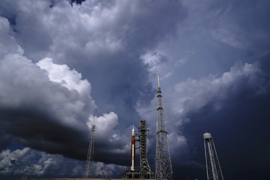FILE - The NASA moon rocket stands on Pad 39B before a launch attempt for the Artemis 1 mission to orbit the moon at the Kennedy Space Center, Friday, Sept. 2, 2022, in Cape Canaveral, Fla. On Friday, Sept. 23, 2022, a storm in the Caribbean is threatening to delay NASA's third attempt to launch the rocket.